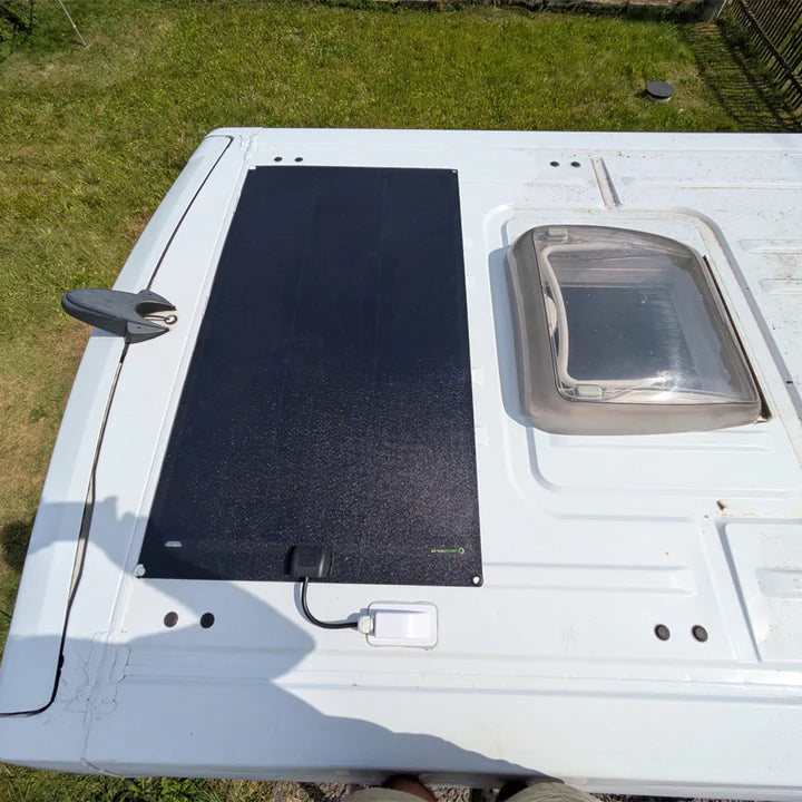 Custom flexible solar panel installed on a trailer roof